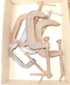 A group of clamps in a box

AI-generated content may be incorrect.