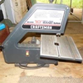 A blue tool box with black and silver tool in it

AI-generated content may be incorrect.