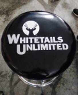 A black and white object with a yellow handle

AI-generated content may be incorrect.