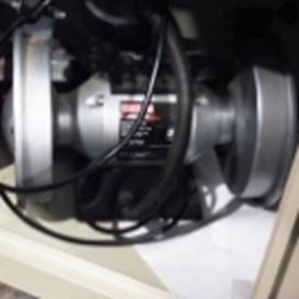 A close-up of a air compressor

AI-generated content may be incorrect.